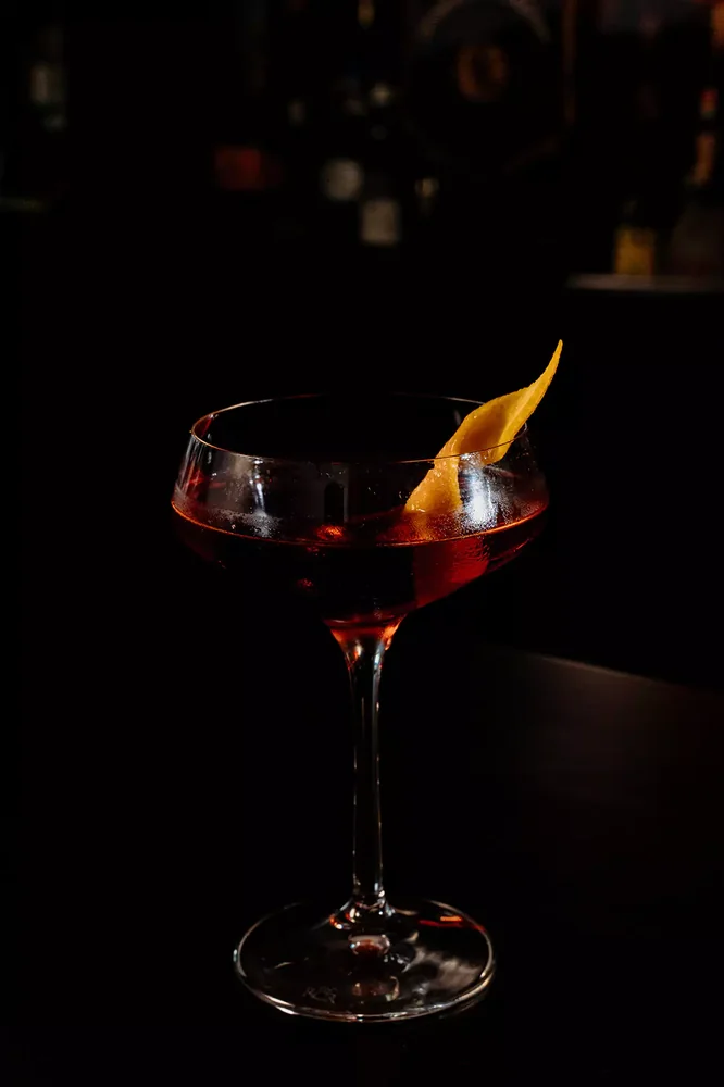 Boulevardier served in glassware
