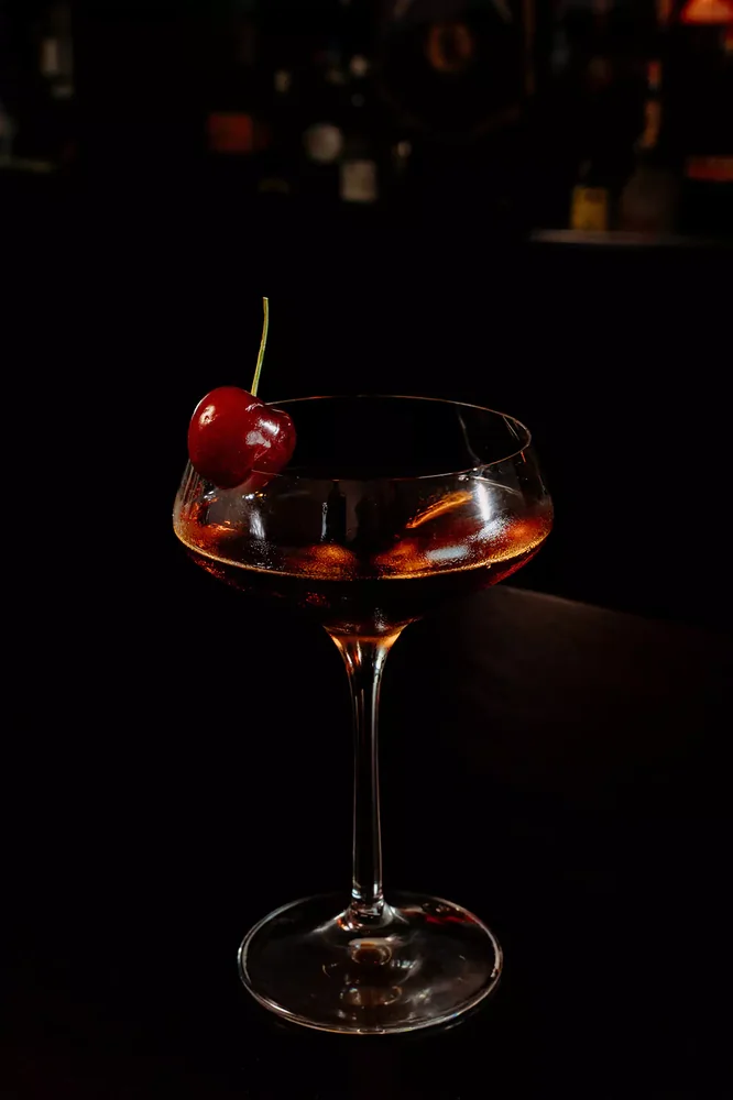 Bourbon Manhattan served in glassware